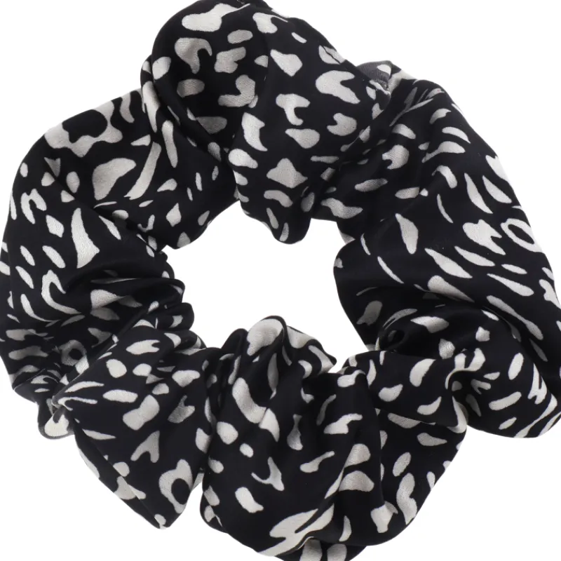 hiusdonitsi-miny-mustavalkoine-GrxTJStU-0.webp Miny Hiuskoristeet Ja Hiustenhoitovälineet^Hiusdonitsi Musta/valkoinen