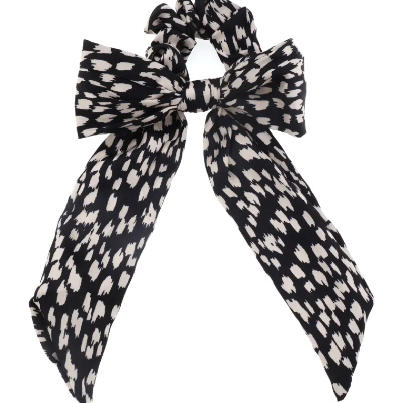 huividonitsi-miny-mustavalkoin-PHmACeJX-0.webp Miny Hiuskoristeet Ja Hiustenhoitovälineet^Huividonitsi Musta/valkoinen